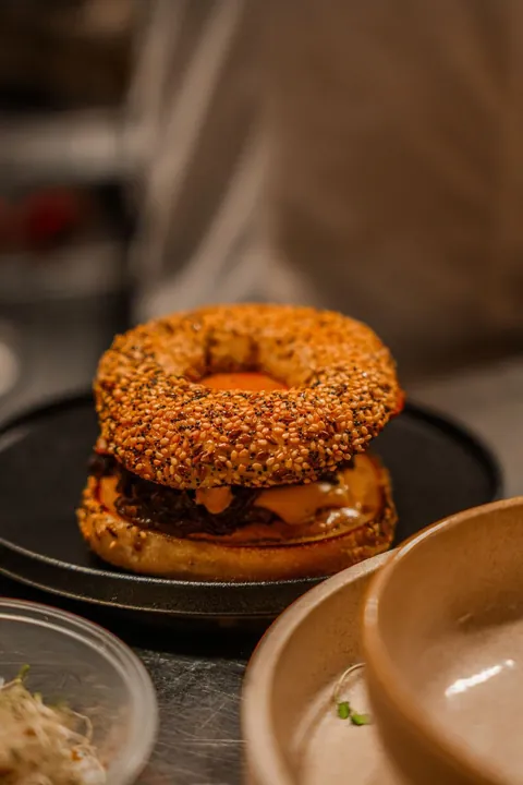 Seeded bagel burger at Atrio