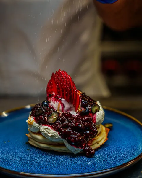 Berry compote pancake stack at Atrio