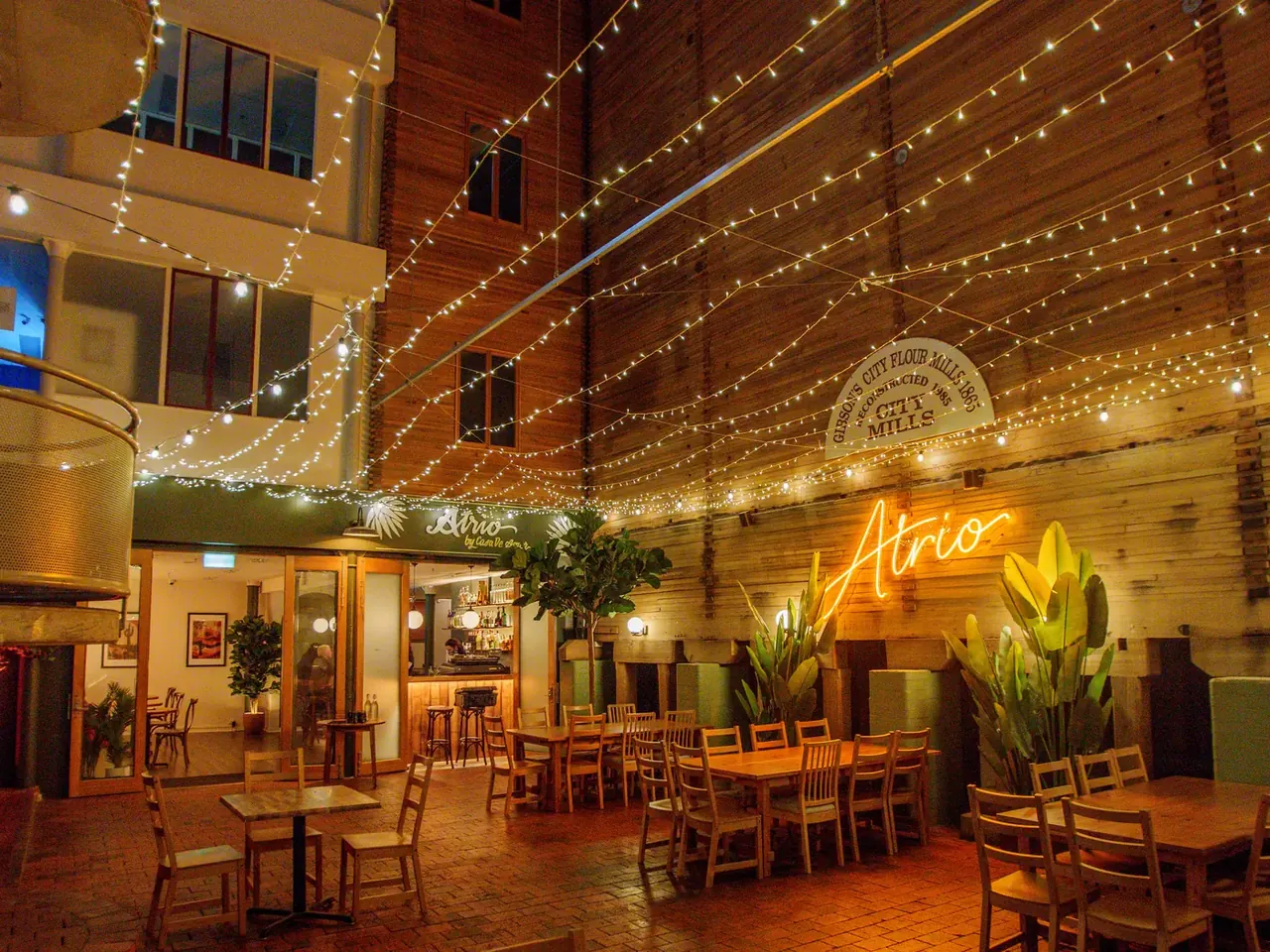 The Whole Atrium set for an evening event with string lights